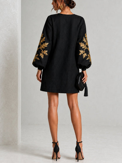 Black Mini Dress with Gold Print and Lantern Sleeves