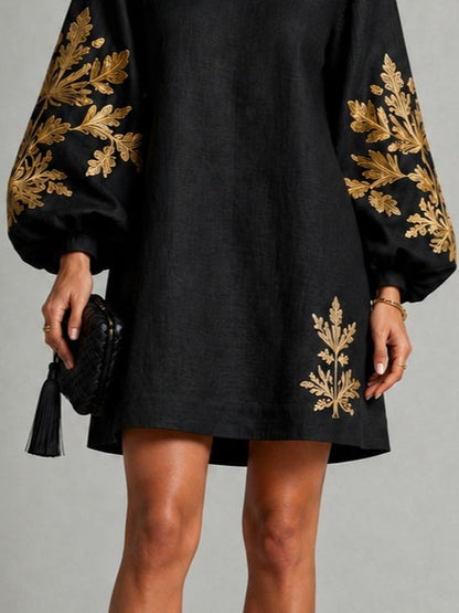 Black Mini Dress with Gold Print and Lantern Sleeves